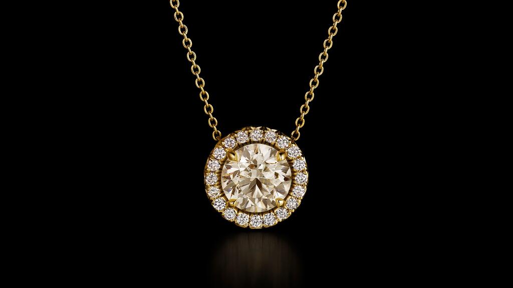 De Beers Desert Diamonds Icons Campaign Halo Solitaire Pendant